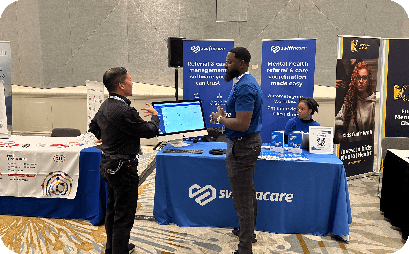 Swiftacare team at a conference booth